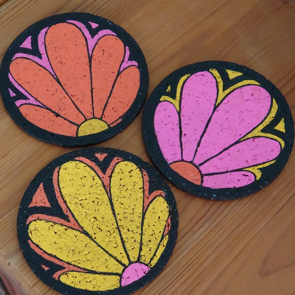 Hånddekorerede ølbrikker